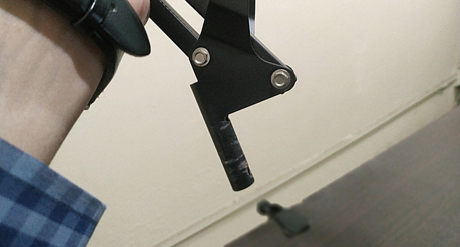 A picture of inserting the snakemouth mic holder into its stand